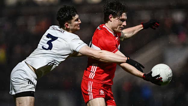 Ethan Doherty, Derry, and Padraic Spillane, Kildare, in Allianz Football League action. Photo by Ben McShane/Sportsfile