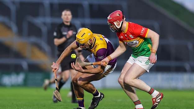 Tomás Kinsella, Wexford, and Dion Wall, Carlow, in Allianz Hurling League action. Photo by Michael P Ryan/Sportsfile
