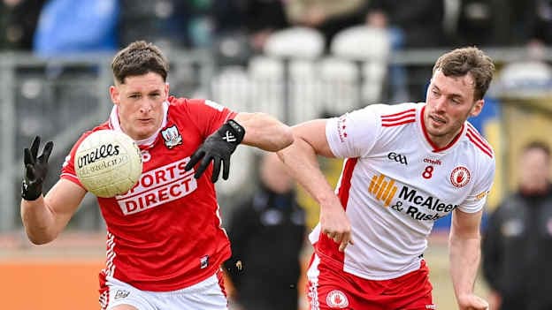 Colm O'Callaghan, Cork, and Brian Kennedy, Tyrone, in Allianz Football League action. Photo by Oliver McVeigh/Sportsfile