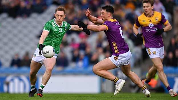 Peter Nash, Limerick, and Eoghan Nolan, Wexford, in Allianz Football League action. Photo by Ramsey Cardy/Sportsfile