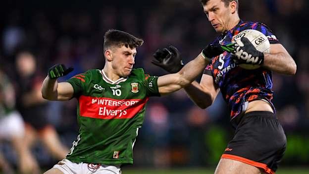 Ethan Rafferty, Armagh, and Davitt Neary, Mayo, in Allianz Football League action. Photo by David Fitzgerald/Sportsfile