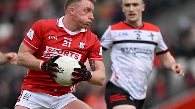 Brian Hurley, Cork, and Daire Nally, Louth, in Allianz Football League action. Photo by Brendan Moran/Sportsfile