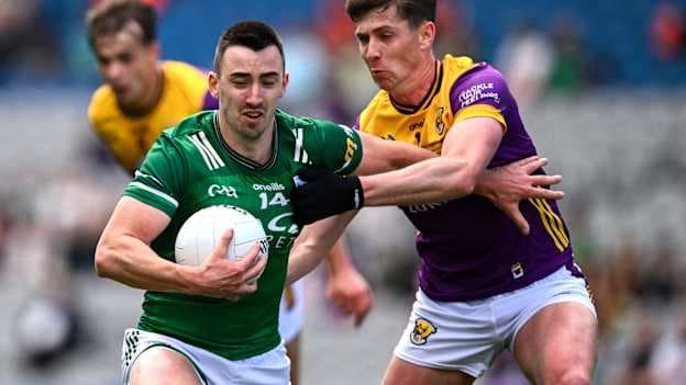 Garvan Jones, Fermanagh, and is Gavin Sheehan, Wexford, in Tailteann Cup action. Photo by Ray McManus/Sportsfile