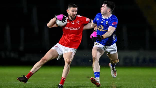 Ciaran Downey, Louth, and Niall Carolan, Cavan, in Allianz Football League Division Two action. Photo by Ben McShane/Sportsfile