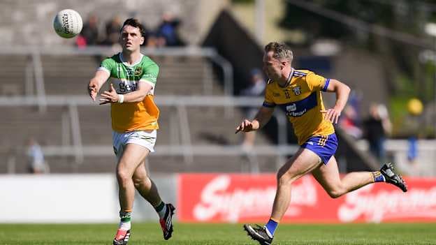 Nathan Poland, Offaly, and Gavin Murray, Clare, in Tailteann Cup action. Photo by John Sheridan/Sportsfile