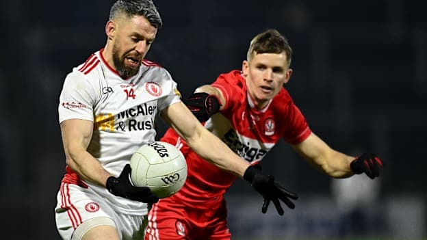 Mattie Donnelly, Tyrone, and Rory Forbes, Derry, in Allianz Football League Division Two action. Photo by Oliver McVeigh/Sportsfile