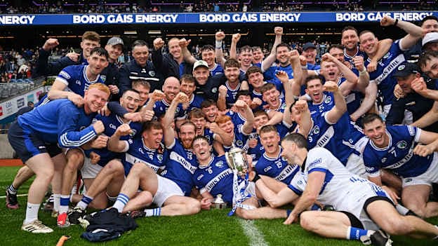 The Laois team celebrate with the Joe McDonagh Cup. Photo by Ramsey Cardy/Sportsfile